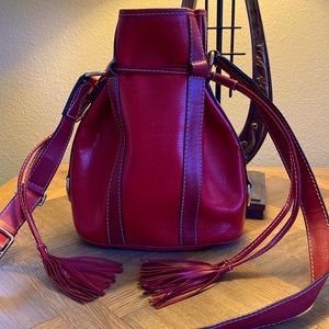 Lancel Paris large sized red embossed leather bucket bag